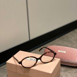 MIU MIU Oval-frame tortoiseshell acetate optical glasses